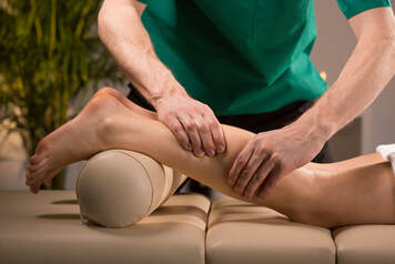 woman having leg massage 