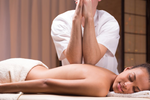woman getting deep tissue massage 