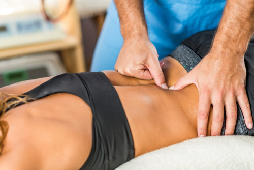 woman getting deep tissue massage