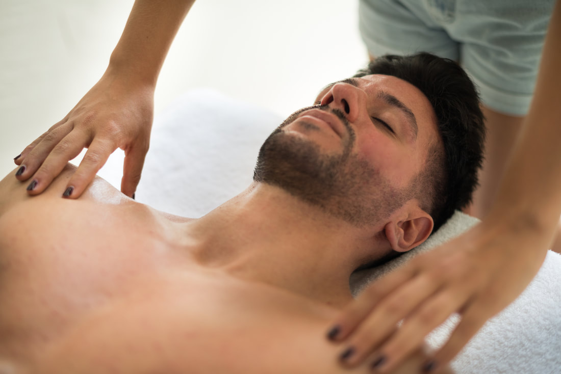 man having shoulders massage 